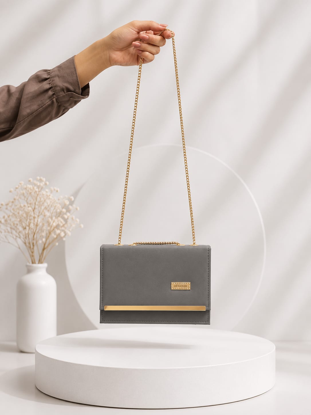 Elegant Matte Charcoal Clutch with Gold-Tone Chain"